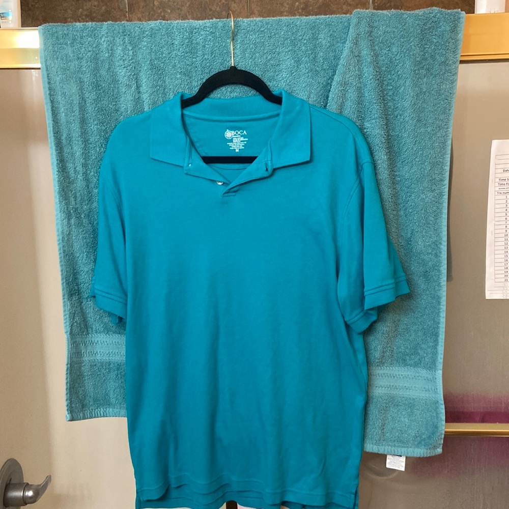 Light teal Boca Classic men’s medium polo shirt.